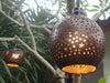Hand carved coconut shell decor piece showing artisan craftsmanship from Bali