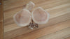 Top view of wooden mushroom decor showing natural carved shapes and organic wood grain