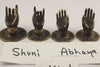 Shuni vs Abhaya mudra brass hand hooks shown side by side for style comparison.