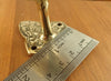 Mounting plate and hole spacing measurement for skull spine door handle installation on doors