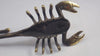 Witchy home decor with brass scorpion wall hook